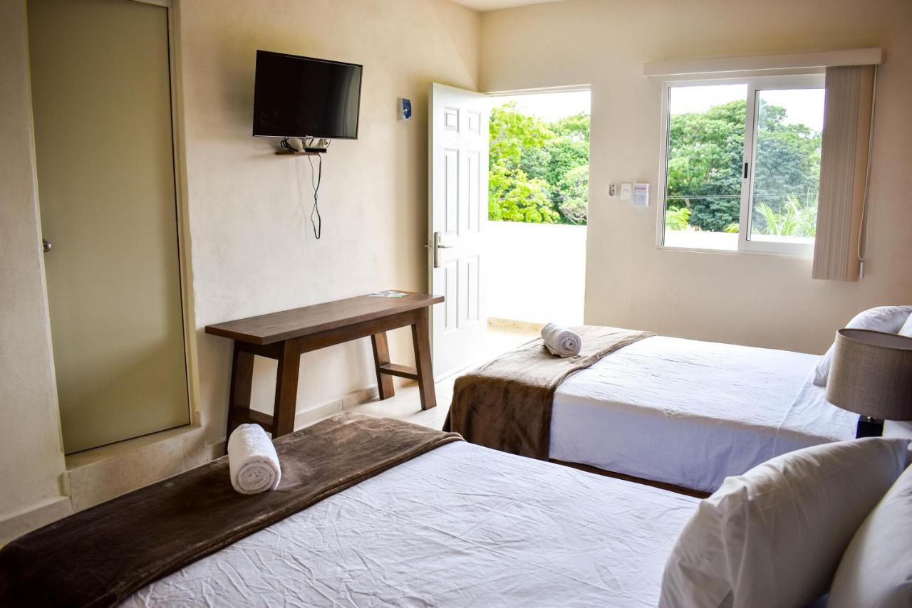 Hotel Muchin ปัวร์โตโมเรลอส ภายนอก รูปภาพ