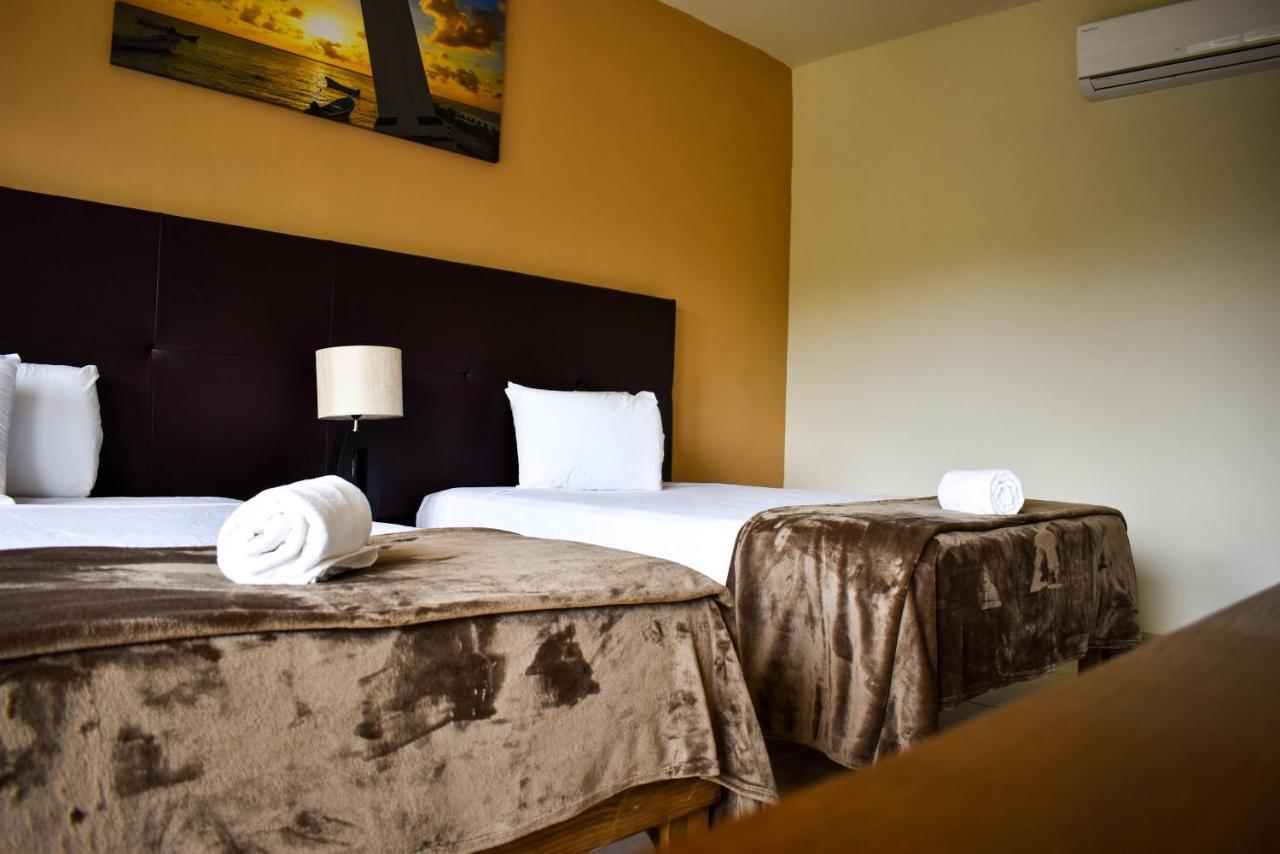 Hotel Muchin ปัวร์โตโมเรลอส ภายนอก รูปภาพ